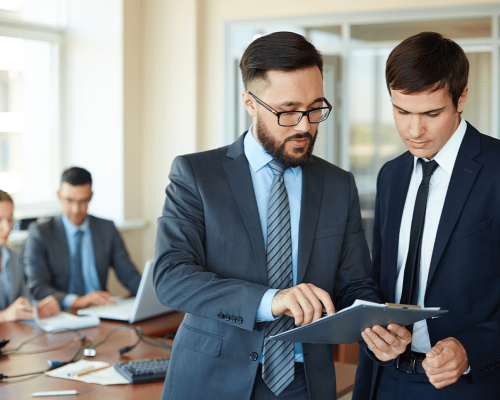 businessman-showing-changes-report